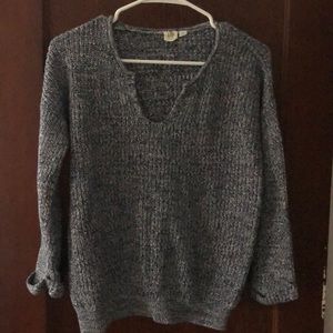 Navy and white sweater.